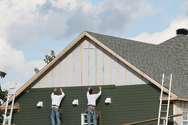 Professional Siding technician working in Bath, PA